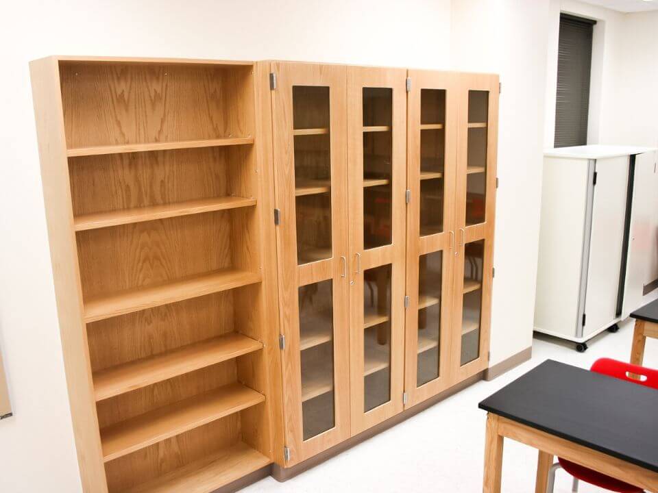 Tall Wooden Casework with Glass Fronts