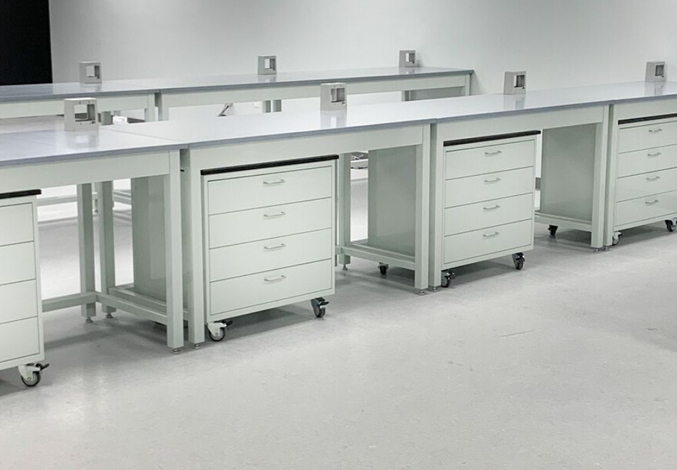 lab tables with phenolic resin countertops and mobile cabinets