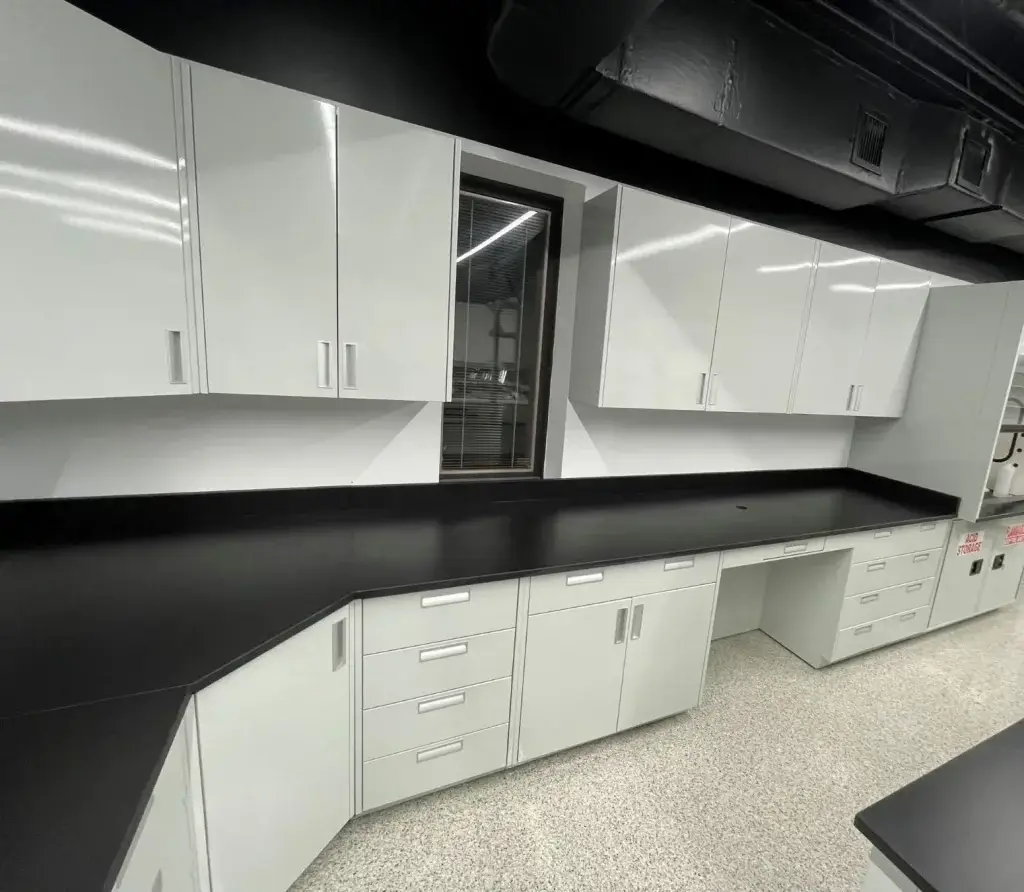 Epoxy resin countertops on lab cabinets.