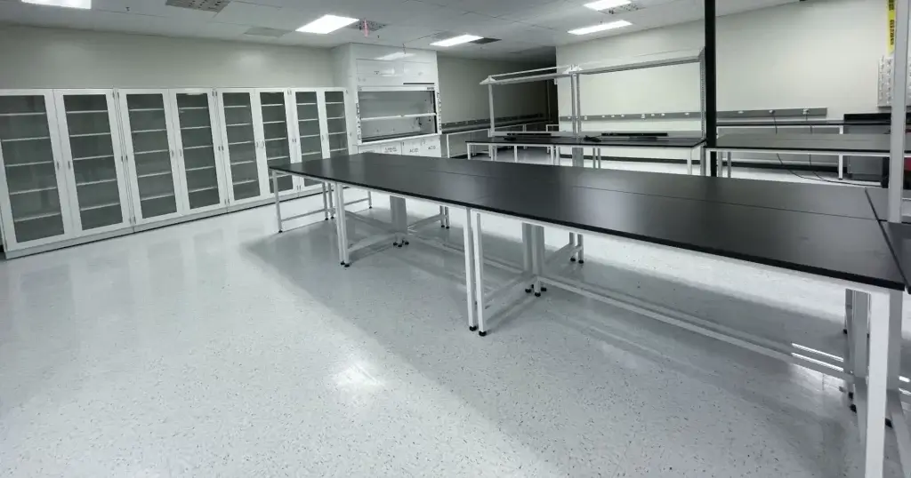 Tall laboratory cabinets with glass front doors.