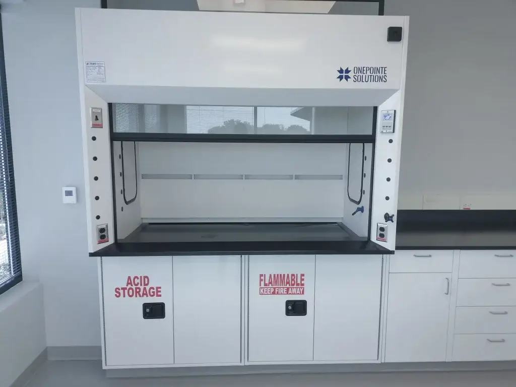 White Fume Hood with acid storage and flammable cabinets.