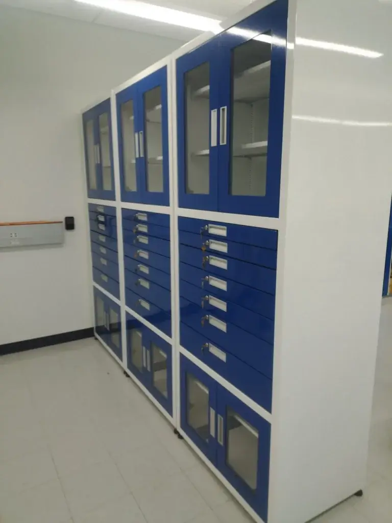 Two toned blue and white tall metal cabinets.