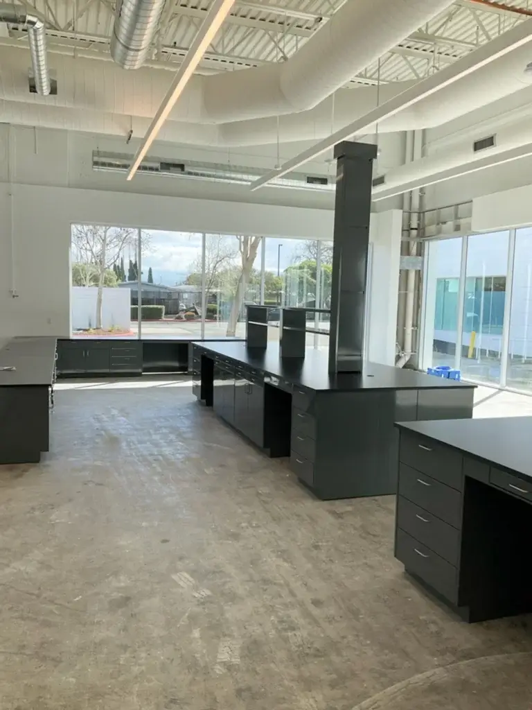 Gray powder coated metal laboratory cabinets.