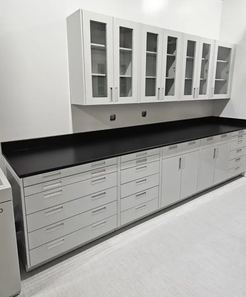 Laboratory casework run with glass front wall cabinets