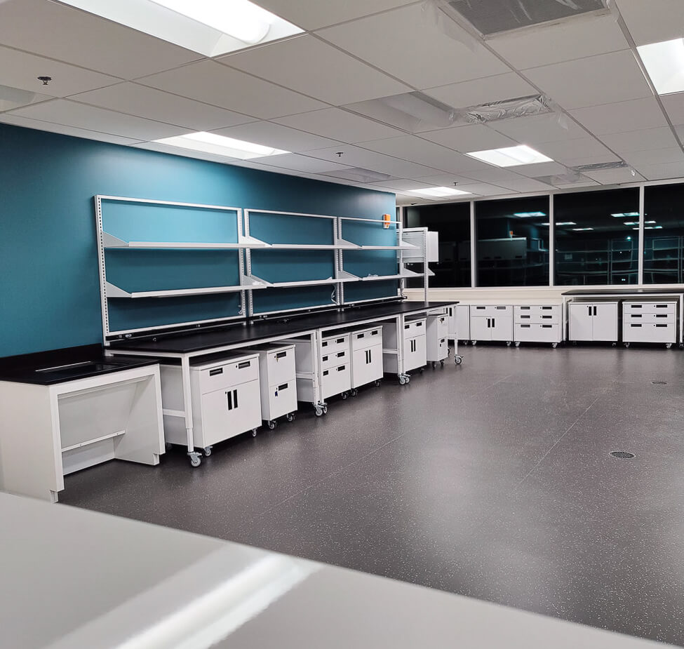 White mobile cabinets with tables.