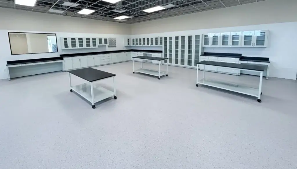 Light grey laboratory cabinets with glass front doors