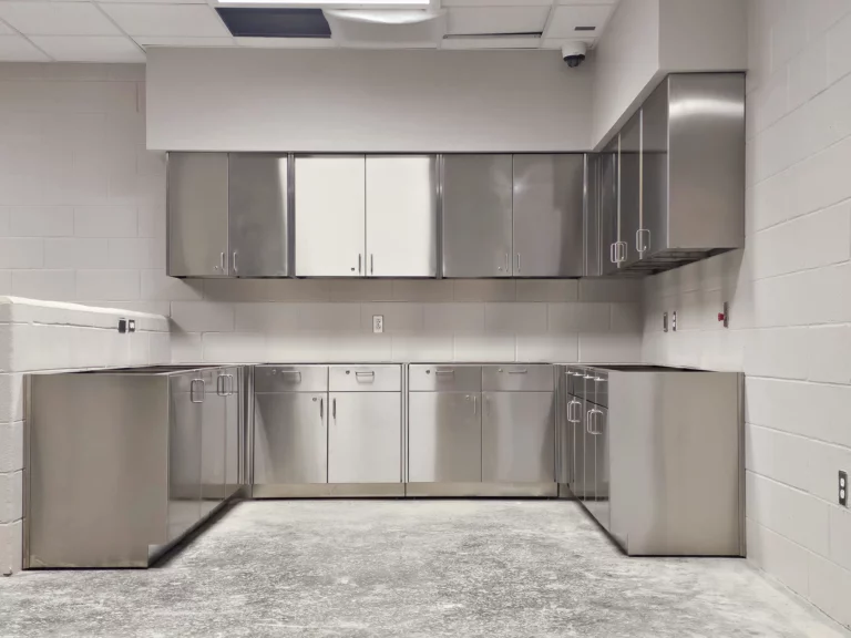 Stainless Steel laboratory Cabinets with wall and base cabinets.
