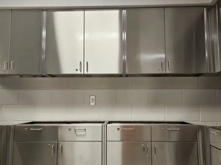 Stainless steel casework with wall and base cabinets
