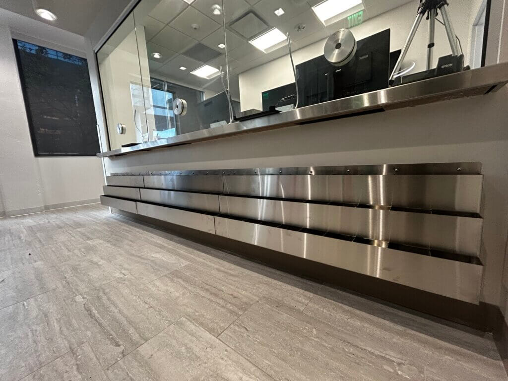 Bespoke Stainless Steel Pamphlet Slots | Custom Metal Work | OnePointe Solutions