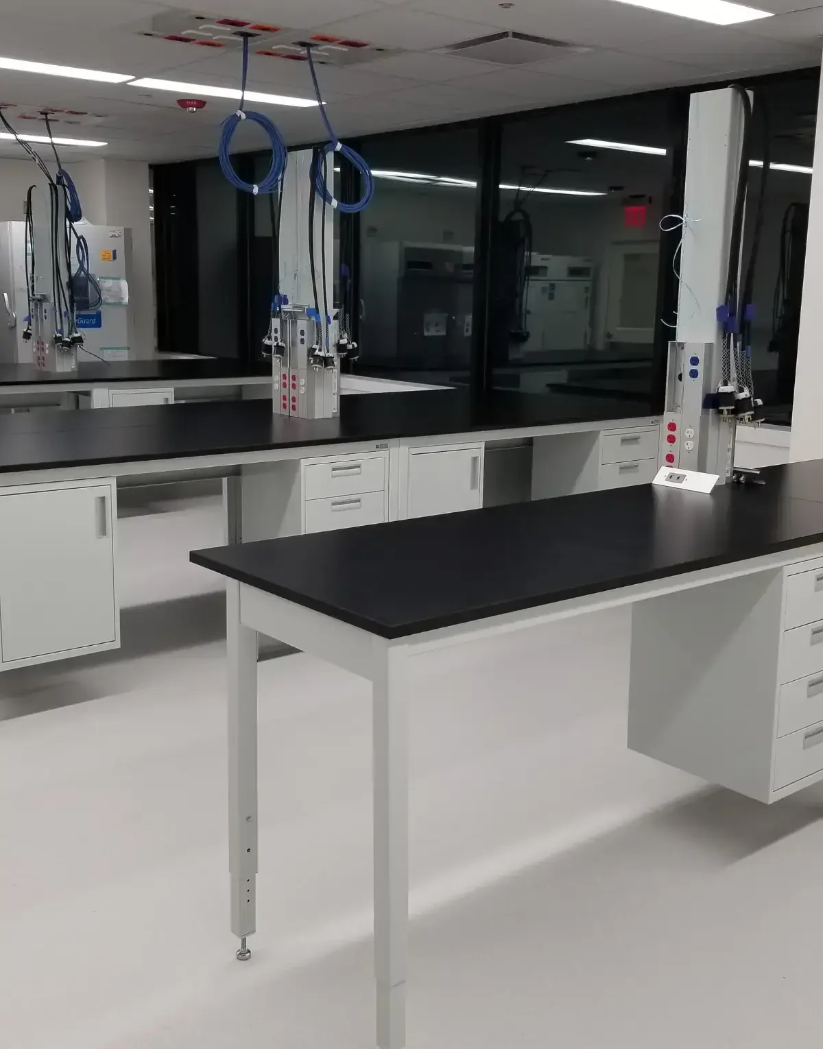 Manual Adjustable Height Lab Tables for BioPharm Research - OnePointe Solutions