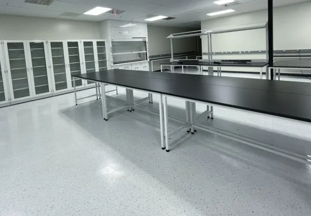 Tall laboratory cabinets with glass front doors.
