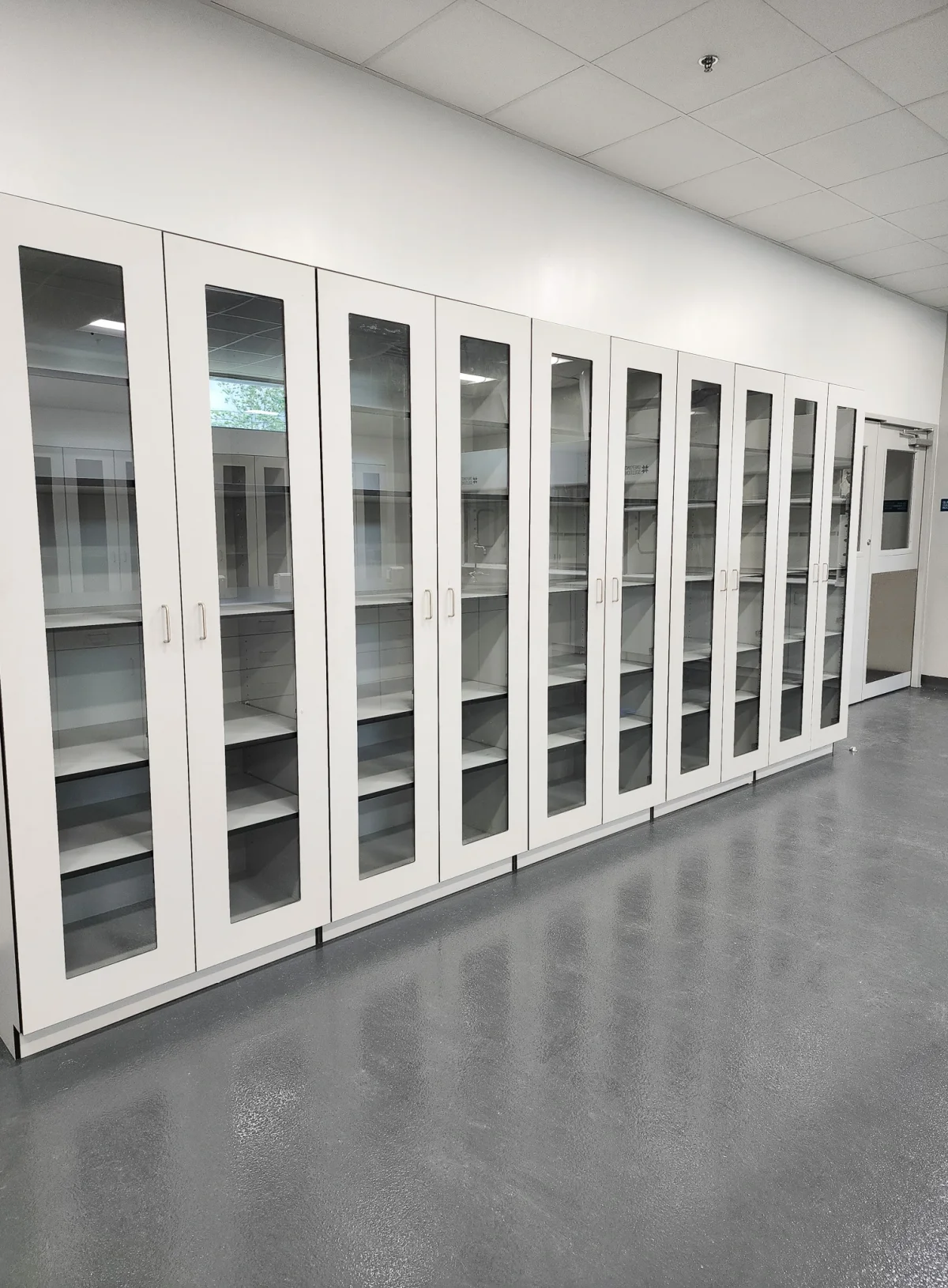 White Tall Phenolic Cabinets with Glass Doors